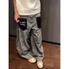 Jeans de estilo retro americano con bloques de color, bolsillo trasero invertido y estampado de leopardo para hombre y mujer, diseño de primavera, pantalones holgados de pierna ancha con curva, modernos