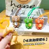 Novo chaveiro de silicone em formato de animal fofo de desenho animado, apresentando um pequeno dinossauro e urso, projetado para aliviar o estresse e ser divertido de apertar