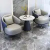 Mesa y Sillas de Negociación Nórdicas Oficina de Ventas Vestíbulo de Recepción Balcón de Ocio Sofá Individual de Cuero Juego de Mesa de Café