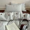 Juego de cuatro piezas de gasa de doble capa grado A, funda de edredón con botones, sábana plana y sábana bajera, algodón lavado liso, adecuado para dormitorios de estudiantes, juego de tres piezas