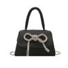 Bolso Pequeño de Lazo de Textura de Alta Gama para Mujer Verano 2025 Nuevo Bolso Bandolera de Cadena para Lápiz Labial Cartera Mini Bolso Cuadrado Pequeño