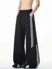 Pantalones casuales de retazos a rayas estilo americano para hombre, corte limpio, pantalones deportivos de pierna recta, pantalones de pierna ancha holgados de moda para otoño
