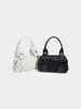 Bolsa Feminina Cor Sólida com Rebites 2026 Estilo Novo Retrô Bolsa para Trabalho Punk Motociclista Grande Capacidade Sob o Braço Bolsa de Ombro Fashion