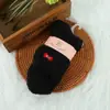 Calcetines de terciopelo de coral de color liso para Otoño e Invierno con lazo bordado, calcetines de medio terciopelo, calcetines gruesos cálidos para el hogar, calcetines para dormir en el suelo