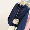 Sudadera con capucha de color liso compuesta de manga larga estilo americano, tiro real, nueva chaqueta fina holgada estilo coreano para primavera y otoño para mujer