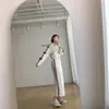 Jaqueta Listrada de Manga Longa com Laço Embellished de Outono Nicho Redutora de Idade + Saia Longa Reta para Mulheres