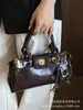 Bolso de mano de lujo nicho de alta gama para mujer, nuevo bolso de hombro y cruzado retro de moda para verano 2026