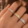 Bestseller transfronterizo: Anillo de acero de titanio con circonita estrellada, anillo de pareja, anillo de diamante simple y elegante, joyería directamente del fabricante