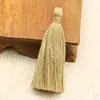Fábrica en stock accesorios de ropa con borla sin cabeza multicolor opcional algodón poliéster borla hecha a mano DIY decorativa pequeña oreja colgante