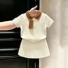Estilo Coreano Meninas Verão 2026 Novo Conjunto de Tricô Fino Branco Bebê Tricô de Trança Gola Polo Manga Curta Saia