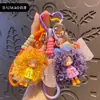 Chaveiro de menina de desenho animado moderno e descolada com cabelo cacheado, pingente de silicone, boneca Nai Fu, acessório para bolsa feminina, pequeno presente chaveiro