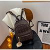 Mochila con relieve de alta gama para mujer, nueva mochila de viaje de moda 2025 para estudiantes universitarias.