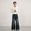 2026 Nova Marca Americana Tendência Jeans Irregular Desconstruído Dividido Cintura Alta para Homens e Mulheres Senso de Design Calças Longas Emagrecedoras