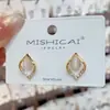 Pendientes Geométricos con Forma de Gota de Agua Estilo Coreano con Diseño Único, Pendientes Modernos con Piedra Ojo de Gato, Accesorios Versátiles para Orejas