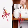 Estilo Ins de Verano Exquisito Colgante de Bolso Cachorro Miu Colgante de Bolso Pareja Llavero de Coche Hecho a Mano Fábrica