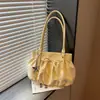 Versátil y Exquisito Transfronterizo Nuevo Estilo Verano 2026 Moda de Alta Gama para Viajes Cotidianos Diseño de Nicho Bolso Tote de Hombro Único Bajo el Brazo