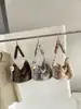 Otoño/Invierno 2026 Nuevo Estilo Coreano Bolso de Axila de Felpa con Estampado de Leopardo Perezoso Bolso de Hombro Único de Piel Atmosférico