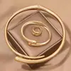1 Conjunto de Anel Geométrico Simples de Liga Pesada em Forma de Anel Pulseira Gargantilha Lisa para Mulheres Conjunto de Joias Cruzamento Atacado