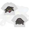 2026 Verano Hip-Hop Dibujos Animados Patrón Nuevo Transfronterizo Camiseta Estampada Estilo Harajuku Ropa de Manga Corta para Hombre