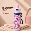 Taza Aislada con Estampado de Leopardo Acero Inoxidable 316 Correa Portátil Tapa abatible Alta Apariencia Compañero Estudiantil Taza con Popote