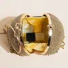 Moda europea y americana transfronteriza de alta gama con borlas de diamantes de imitación, bola de oro, pulsera de diamantes redondos, vestido de princesa socialité, bolso de mano para cena