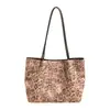 Bolsa Grande Estampa de Leopardo Feminina Nova Outono 2026 Retro Simples de Ombro e Mão Versátil Bolsa Tote para o Dia a Dia