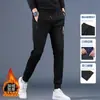 Envío RápidoPantalones de hombre con forro polar de invierno, con cremallera lateral, múltiples bolsillos, cintura alta elástica, corte holgado, pants deportivos, pantalones de deporte