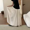 Falda plisada fluida estilo coreano para mujer, nuevo estilo verano 2026, elegante y con caída, diseño de dobladillo ancho, falda larga que estiliza y cubre las caderas