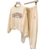 Conjunto Esportivo Casual para Mulheres, Simples 2026 Primavera e Outono Nova Moda Estampado Blusão Solto e Calça Longa Conjunto de Duas Peças