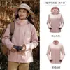 Tmall con el mismo estilo ropa de montaña impermeable a prueba de viento desmontable tres en uno para mujer otoño e invierno abrigo hombre