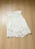 Conjunto de Dos Piezas de Encaje Soluble en Agua Estilo Francés Verano 2026 para Mujer, Top sin Mangas Calado y Falda Midi Irregular