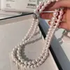 Collar de Perlas de Imitación Rosa Flor de Cerezo Cadena para Clavícula de Verano para Mujer Cadena de Cuello Estilo Hada Delicado de Lujo Ligero