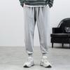 Outono e inverno calças casuais masculinas de cor sólida solta no tornozelo forrado de lã calças de moletom esportes juvenis calças cortadas calças marca de moda