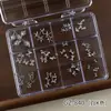 Conjunto de 12 Grades de Acessórios para Nail Art Estilo Oceano em Liga Metálica Estrela do Mar Dourada e Prateada Concha Mini Laço Acessórios de Unha Vestíveis
