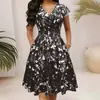 La nueva colección de verano de Amazon presenta un vestido largo con cuello redondo, bolsillos, manga corta, estampado de moda, elegante y estiloso para mujer
