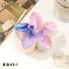 Nuevo Clip de Huevo con Flores Qiyue Moda Impresión UV Pasador de Orquídea Florale Clip de Tiburón Creativo Europeo y Americano