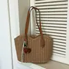 Bolso de paja con borlas transfronterizo, nuevo bolso tejido de paja, bolso de playa para vacaciones, bolso de hombro versátil, bolso tote de verano para el día a día