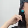 Pendientes de flor tejida azul Klein explosión de verano diseño fresco dulce personalidad exquisita joyería para orejas de moda