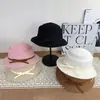 Nuevo Estilo Coreano Otoño/Invierno Estilo Hepburn Mezcla de Lana Cálido Moda Versátil Sombrero de Pescador Lazo Hace que la Cara se Vea Más Pequeña Moderno