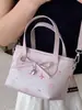 Bolso de Mano de Moda con Relieve de Mariposa para Mujer 2026 Nuevo Estilo Bolso Cruzado de Hombro Texturizado Bolso Cubo de Gran Capacidad para el Trabajo