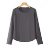 Nuevo top de otoño de punto acanalado con cuello redondo y manga larga, moda simple y elegante, cómoda camiseta básica con dobladillo curvo, color liso para mujer