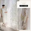 Nuevo estilo de cortinas translúcidas con patrón de ondas de agua, que ofrecen privacidad mientras permiten el paso de la luz, adecuadas para salas de estar y balcones, proporcionando protección solar y disponibles en diseños personalizados.