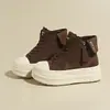 Nuevos zapatos de entrenamiento alemanes de suela gruesa versátiles de primavera retro 2026 mocasines que aumentan la altura para mujeres zapatillas deportivas casuales