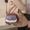 Otoño e Invierno 2025 Nuevo Bolso Cruzado Pequeño de Hombro Moda Lujo Ligero Gama Alta Bolso Redondo Pequeño de Hombro Único Estilo Diario Simple de Moda