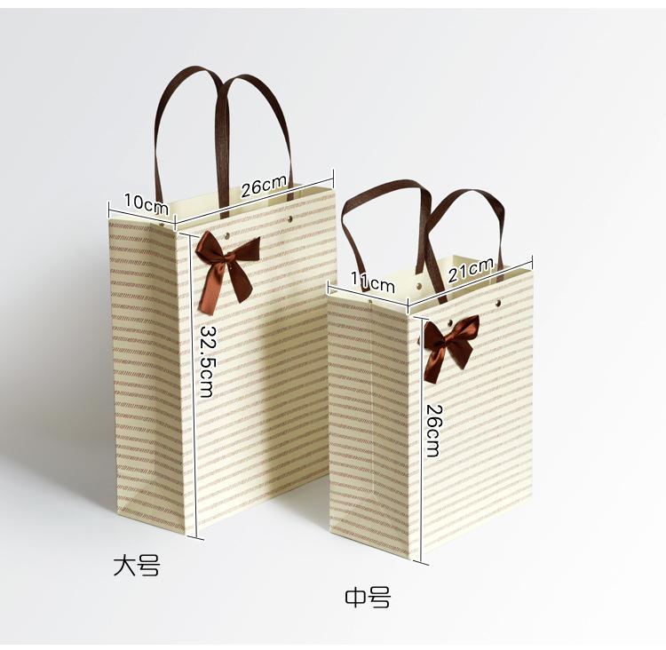 蝴蝶结手提袋_06