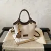 Bolso pequeño de nicho nuevo transfronterizo de alta gama para mujer 2026 moderno versátil de un solo hombro bandolera bolso de mano súper popular de moda