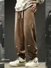 Pantalones deportivos tipo jogger casuales para hombre con bordado de letras estilo americano 2026, pantalones deportivos holgados de otoño, pantalones tipo harén de moda para el trabajo