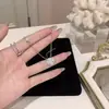 Collar de Zircón Brillante de la Suerte Trébol de Cuatro Hojas Estilo Nuevo Lujo Ligero Gama Alta Nicho Diseño Exquisito Cadena Versátil para la Clavícula para Mujeres