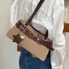 Moderna, retro y elegante, nueva bandolera de alta gama versátil y de nicho para mujer, otoño e invierno 2026
