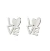 Accesorios Cruz Simple Estilo Acero Inoxidable Material Forma de Corazón Estrella Gato Dibujo Animado Hombre de Jengibre Payaso Aretes de Presión Adornos para Orejas